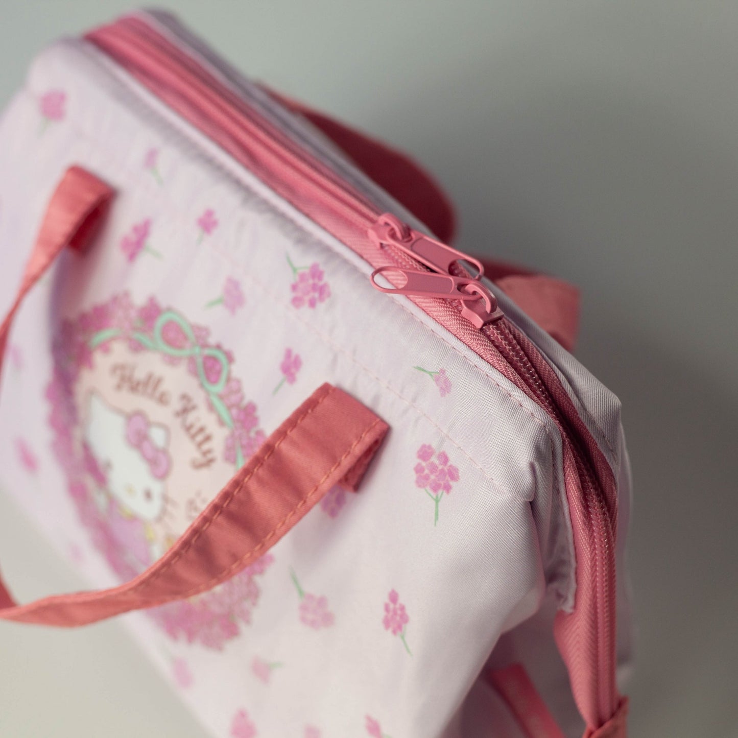 Fiore della borsa di Hello Kitty